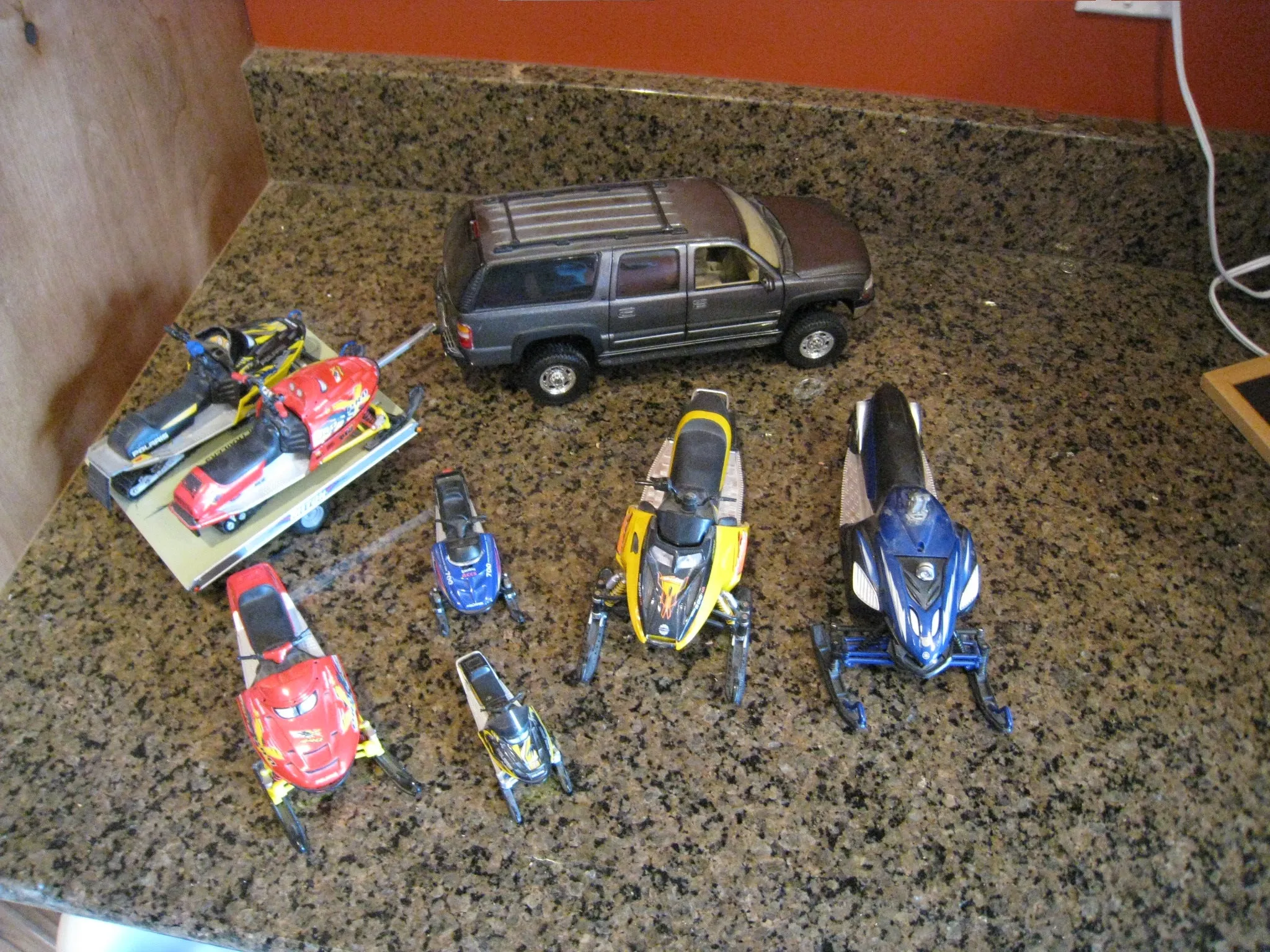 /img/52674-displaying-snowmobile-diecast.webp
