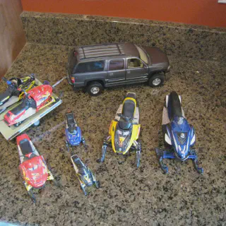/img/52674-displaying-snowmobile-diecast.webp